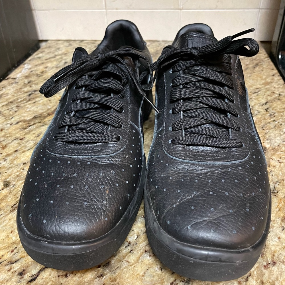 Black leather GV pumas worn twice